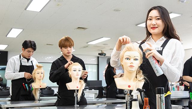 Beauty students practicing professional makeup and aesthetics techniques